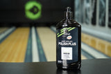 A bottle of TruCut Hand Applied Polish in a bowling alley
